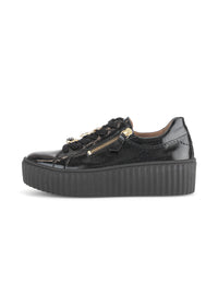 Sneakers with thick soles - black patent leather, golden bumblebees