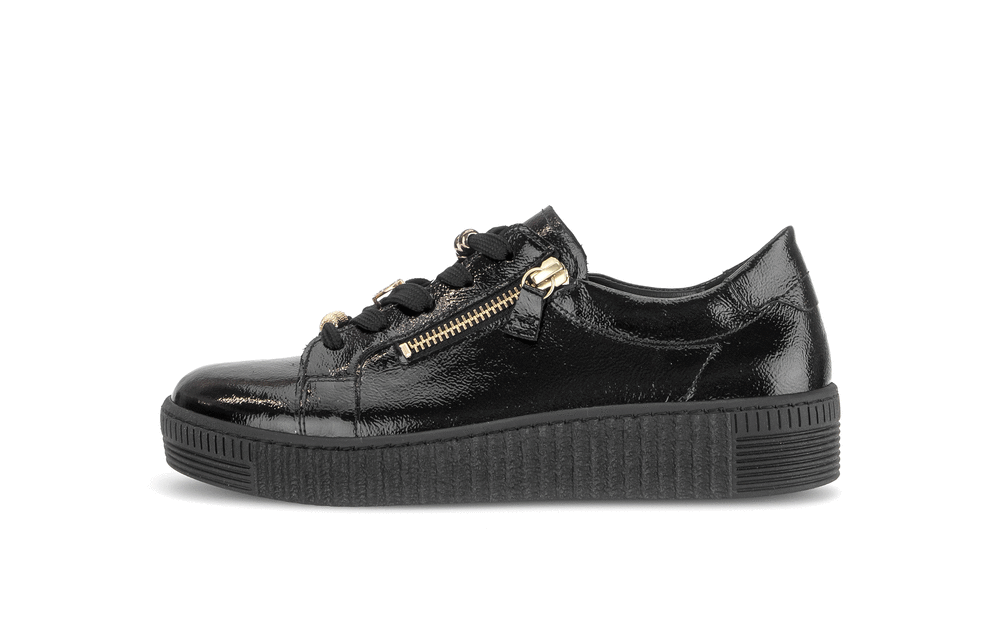 Sneakers with a chunky sole - black patent leather, gold embellishments
