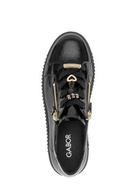 Sneakers with a chunky sole - black patent leather, gold embellishments