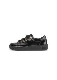 Sneakers with a chunky sole - black patent leather, gold embellishments