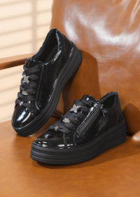 Sneakers with thick soles - black patent leather, silver-colored lace decorations