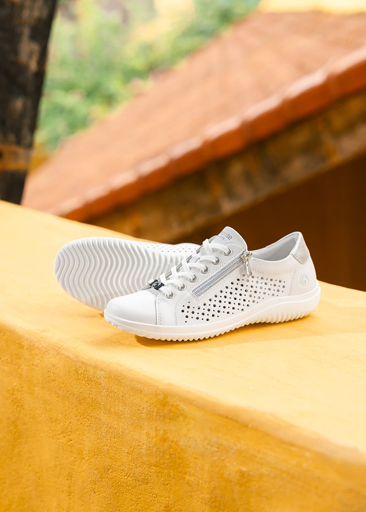 Walking shoes - perforated white leather