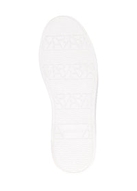 Sneakers - svart läder med hålmönster, gyllene detaljer